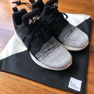 APL Black and White Athletic Shoes with Sleek Design